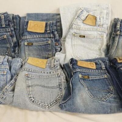 1021	LOT OF EIGHT PAIRS OF VINTAGE USA MADE LEE JEANS. SIX PAIRS ARE YOUTH SIZE 11, TWO ARE SIZE 12. VARYING DEGREES OF WEAR
