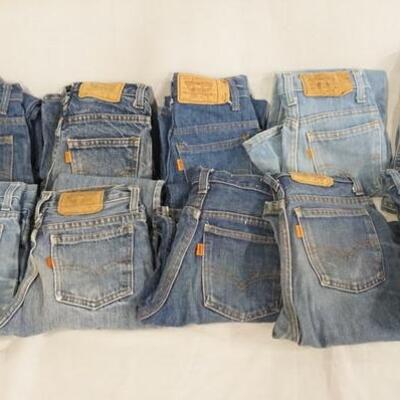 1009	LOT OF TEN PAIRS OF VINTAGE USA MADE LEVI STRAUSS & COMPANY JEANS W/ ORANGE TABS. ALL ARE YOUTH SIZES; 14, TWO ARE SIZE 11, THREE...