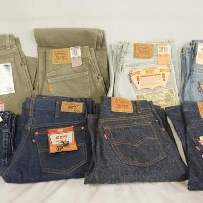 1059	LOT OF EIGHT PAIRS OF VINTAGE LEVIS JEANS NEW W/ TAGS. SIZES ARE; 27 X 32, 27 X 30, 28 X 36, 27 X 28, 28 X 34, 27 X 34, & TWO ARE...