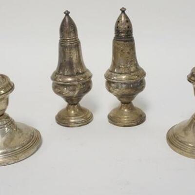 1065	WEIGHTED STERLING SILVER CANDLESTICKS & SHAKERS
