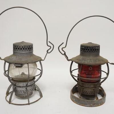 1121	TWO NJC DRESSEL RAILROAD LANTERNS ONE HAS A RIBBED RED GLOBE ONE IS CLEAR. 15 IN H 	70	150	25	PLEASE PAY ATTENTION FOR DAILY...