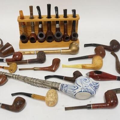 1127	LOT OF 25 PIPES. LOT INCLUDES A 17 1/2 IN PIPE W/ PORCELAIN ELEPHANT HEAD BOWL & A PIPE SHAPED LIKE A ROCKET 	70	150	25	PLEASE PAY...