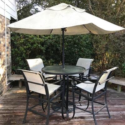 High top set with 4 chairs and umbrella $299