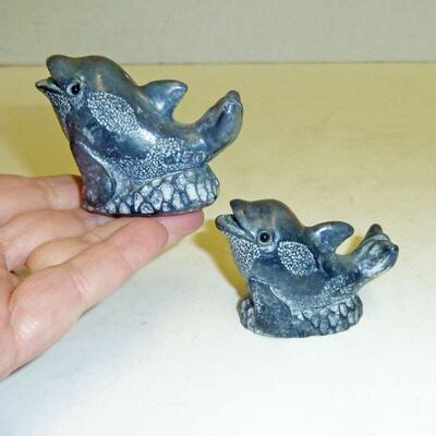 Carved dolphins WEO signed