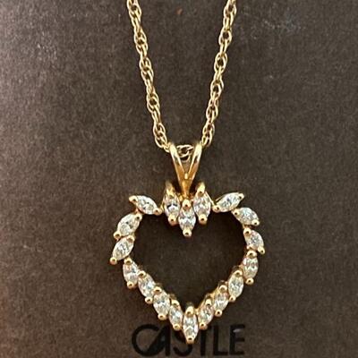 Heart shaped 14 k diamond pendant on 18 inch chain. Chain has safety latch and 4.0 g total wt.