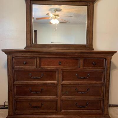 Millennium dresser with mirror sold by Ashley Furniture. Not including the mirror, the dresser measures 62 x 19 x 43. The mirror measures...