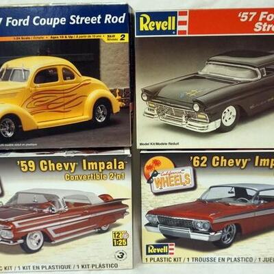 1098	LOT OF 4 REVELL MODEL CAR KITS, CHEVY IMPALA SS, ETC. KITS ARE POSSIBLY COMPLETE, NOT GUARANTEED	50	100	10	PLEASE PAY ATTENTION FOR...