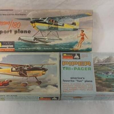 1060	MONOGRAM LOT OF 3 AIRPLANE MODEL KITS, CESSNA 180, PIPER TRI PACER. KITS ARE POSSIBLY COMPLETE, NOT GUARANTEED	50	100	10	PLEASE PAY...