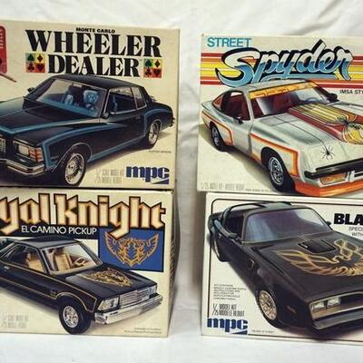 1026	LOT OF 4 MPC MODEL CAR KITS, STREET SPYDER, ROYAL KNIGHT, BLACKBIRD AND WHEELER DEALER, KITS ARE POSSIBLY COMPLETE, NOT GUARENTEED...