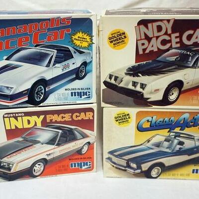 1020	LOT OF 4 MPC MODEL CAR KITS, CAMARO, MUSTANG, MONTE CARLO, INDY PACE CAR, KITS ARE POSSIBLY COMPLETE, NOT GUARENTEED	50	100	10...