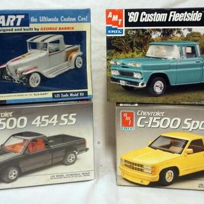 1069	AMT ERTL MODEL TRUCK KITS 2 SEALED. KITS ARE POSSIBLY COMPLETE, NOT GUARANTEED 57 CHEVY ETC.	50	100	10	PLEASE PAY ATTENTION FOR...