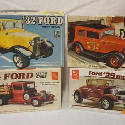1056	LOT OF 4 AMT MODEL CAR KITS, VINTAGE FIRE CHIEF '32 FORD, '34 FORD, AND '29 FORD. KITS ARE POSSIBLY COMPLETE, NOT GUARANTEED	50	100...