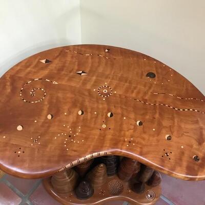 Wood sculpture and inlaid table $850
27 X 18 X 25
