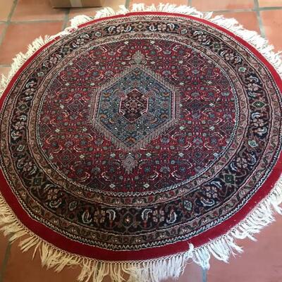Hand knotted round rug $395
67