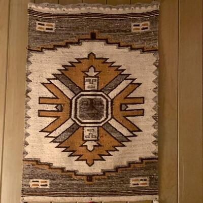 Wool rug has been on the wall since 1970s 