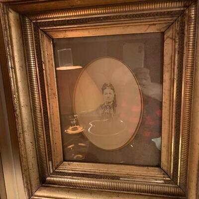 Lovely lady in a gilded frame
