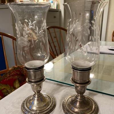 Weighted sterling candlesticks with etched , fluted glass