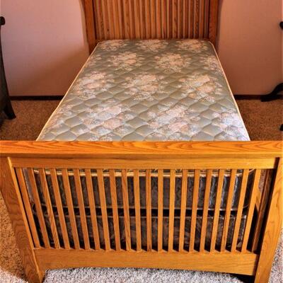 A super nice full size Mission bed with mattress and box springs.  