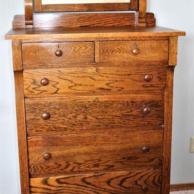 Antique Oak dresser with beveled mirror.