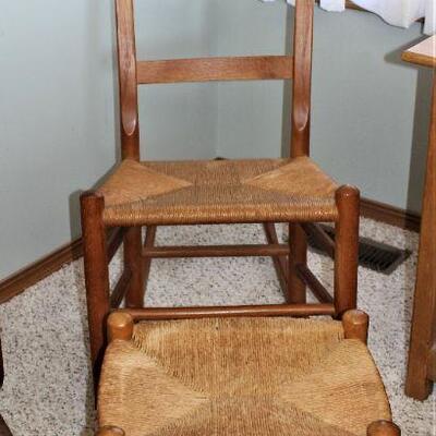 Antique rocker with foot rest.  Take a load off!