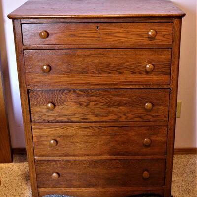 Antique five-drawer dresser.