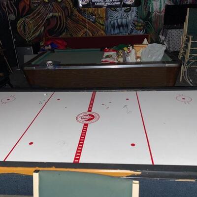 Pool table, ping pong table, and air hockey.