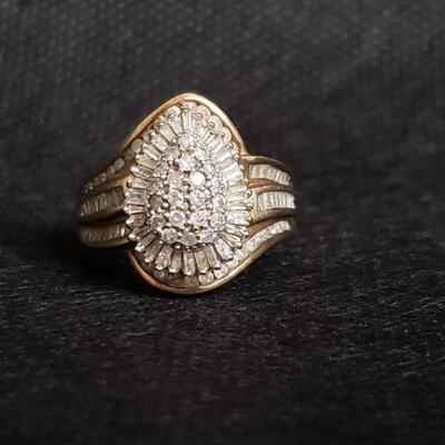 https://ctbids.com/#!/description/share/721044 Numerous authentic diamonds join together to form this gorgeous pear-shaped cluster ring...