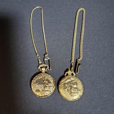 https://ctbids.com/#!/description/share/721124 Pair of gold pocket watches. No movements from either watch. Locomotive watch 2.7oz 16.5