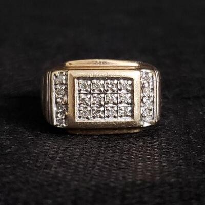 https://ctbids.com/#!/description/share/721045 Twenty authentic diamonds capture your attention when you see this men's ring. Size 12....