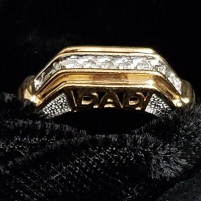 https://ctbids.com/#!/description/share/721046 Diamond and gold men's ring with the word DAD embellishing each side. Size 12. Perfect...