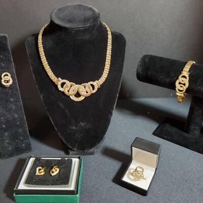 https://ctbids.com/#!/description/share/721050 Beautiful 5 piece diamond and gold set. Includes necklace, bracelet, ring, studded...