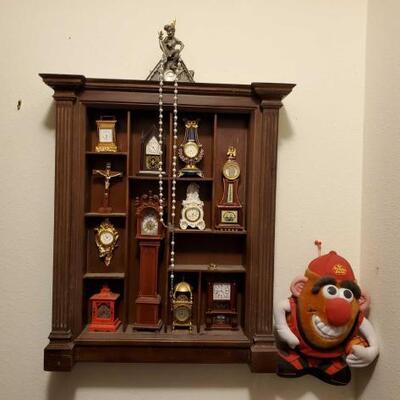 5400	

Clock Display Shelf, Mr. Potato Man, and More!
Shelf Measures Approx 17