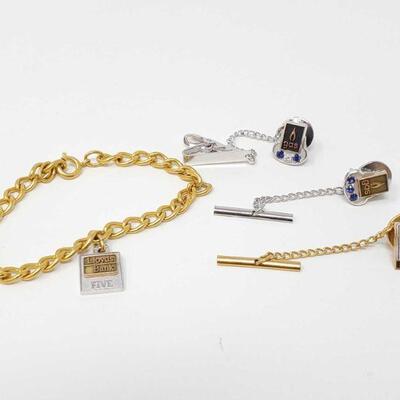 #144 â€¢ 10k Gold Pins And Bracelet overall weight is 23.3g bracelet is NOT gold. 