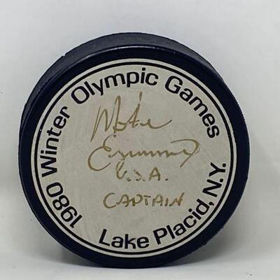 2116	

Signed 1989 Winter Olympic Games Hockey Puck
Signed 1989 Winter Olympic Games Hockey Puck