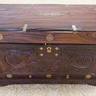 1200	CARVED ROSEWOOD ASIAN STORAGE CHEST W/BRASS MOUNTS & INLAY, INTERIOR HAS TRAYS, CHEST IS IN NEED OF RESTORATION, 36 IN X 16 3/4 IN X...