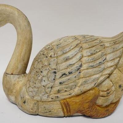 1103	WOODEN CARVED & PAINT DECORATED GOOSE. 16 IN L 9 1/2 IN H 
