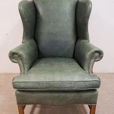 1087	LEXINGTON GREEN LEATHER WING CHAIR W/ACCENT BRASS TACKING
