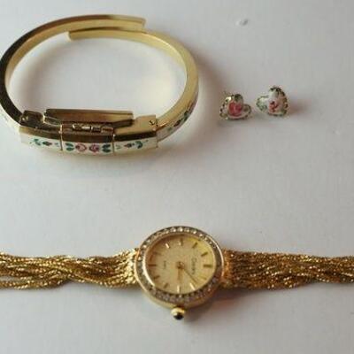 1270	GOLAYSTAHL BRACELET WATCH WITH EARRING AND CARDINI WATCH	25	50	10	PLEASE PAY ATTENTION FOR DAILY ADDITIONS TO THIS SALE. PARTIAL...