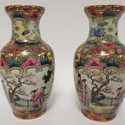 1033	PAIR OF CHARACTER SIGNED ASIAN VASES. 8 IN HIGH
