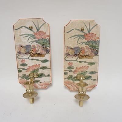 1123	PAIR OF DECORATED POTTERY WALL CANDLE SCONCES W/ BRASS CANDLE HOLDERS. 13 1/2 IN H 5 1/2 IN W 
