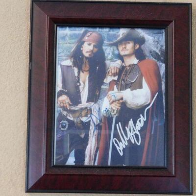 Movie photo signed by Johnny Depp and Orlando Bloom