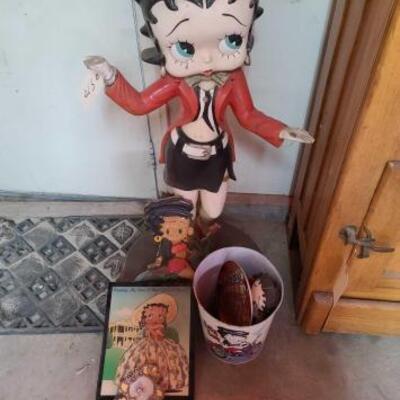 570	
Betty Boop Lot
Betty Boop Statue, Thermometer, Trash Can, Plate, Doll, DVD, Bobble Head And Pictures.