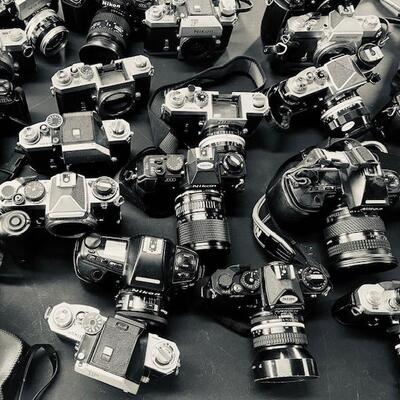 Huge collection of vintage cameras, lenses, bags