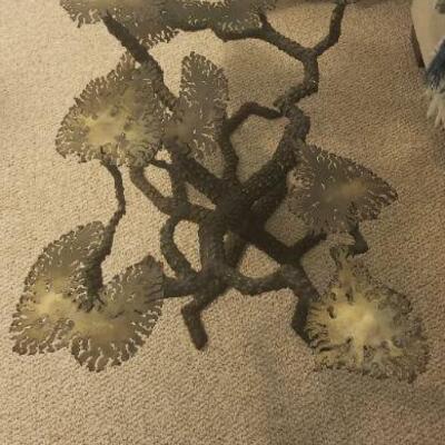 This is a very unique coffee table, the base is made of Brass in the likeness of a Japanese Bonsai tree. The owner thinks this was made...