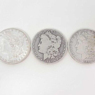 570	

1882, 1884, And 1885 Morgan Silver Dollars
1882, 1884, And 1885 Morgan Silver Dollars