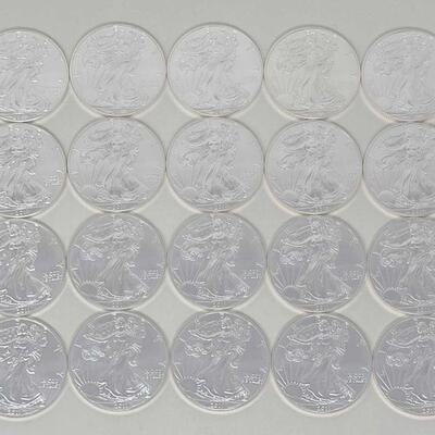 
504	

20 1oz American Silver Eagle One Dollar Coin, 20 Oz
Weighs Approx 20 Oz