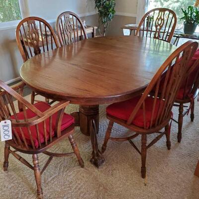 #1000 â€¢ Wooden Dinning Room Table and Chairs measures approx 71x48x30 inches. 