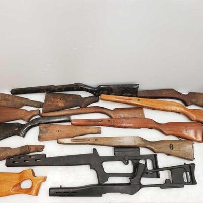 2232	

Fifteen Rifle Stocks
13 Wood Rifle Stocks 2 Hard Plastic Rifle Stocks