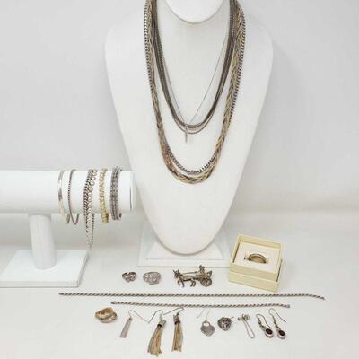 2372	

Sterling Silver Jewelry, 294.4g
Includes Earrings, Rings, Necklaces, Bracelets, And Broach. Weighs Approx 294.4g
 	 