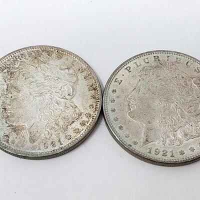 2630	

Two 1921 Morgan Silver Dollars
Two 1921 Morgan Silver Dollars